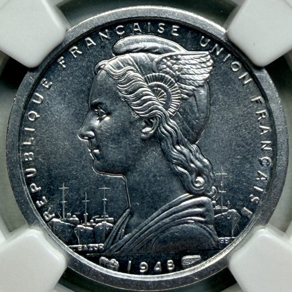 Close-up of the obverse design on a 1948 St. Pierre 1 Franc featuring Marianne and maritime elements.