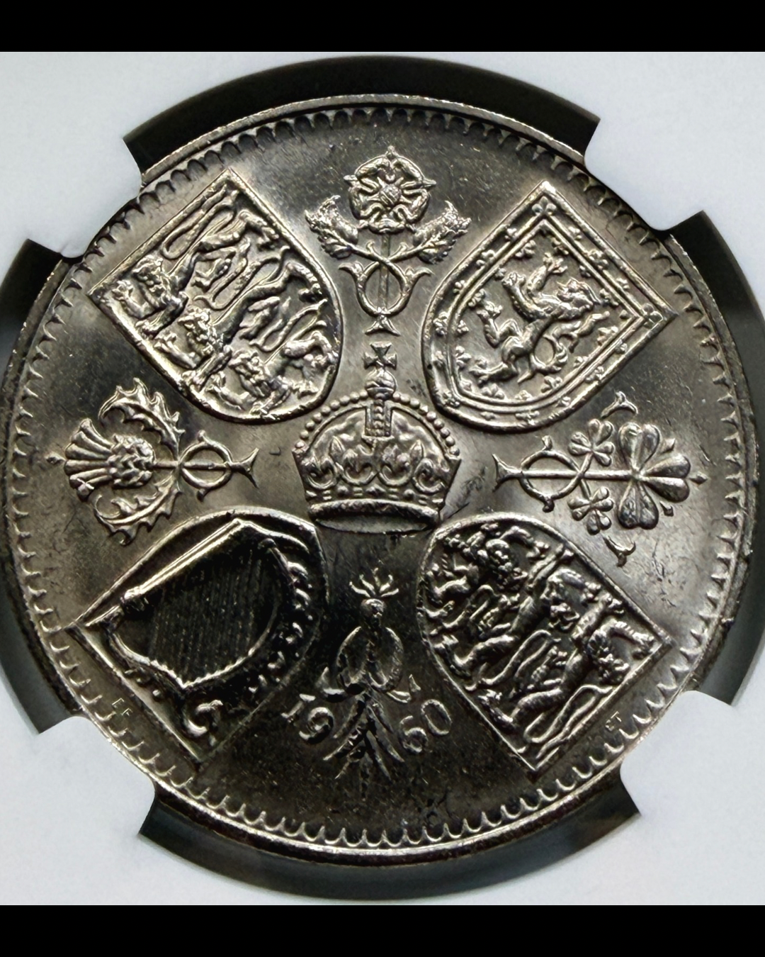 Obverse of a 1960 British Exhibition Crown.