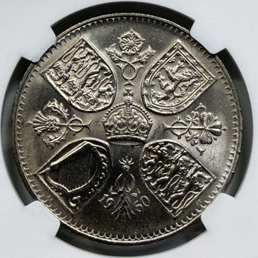 Close-up of the reverse design of the 1960 British Exhibition Crown featuring royal shields, floral emblems, and a crown motif.