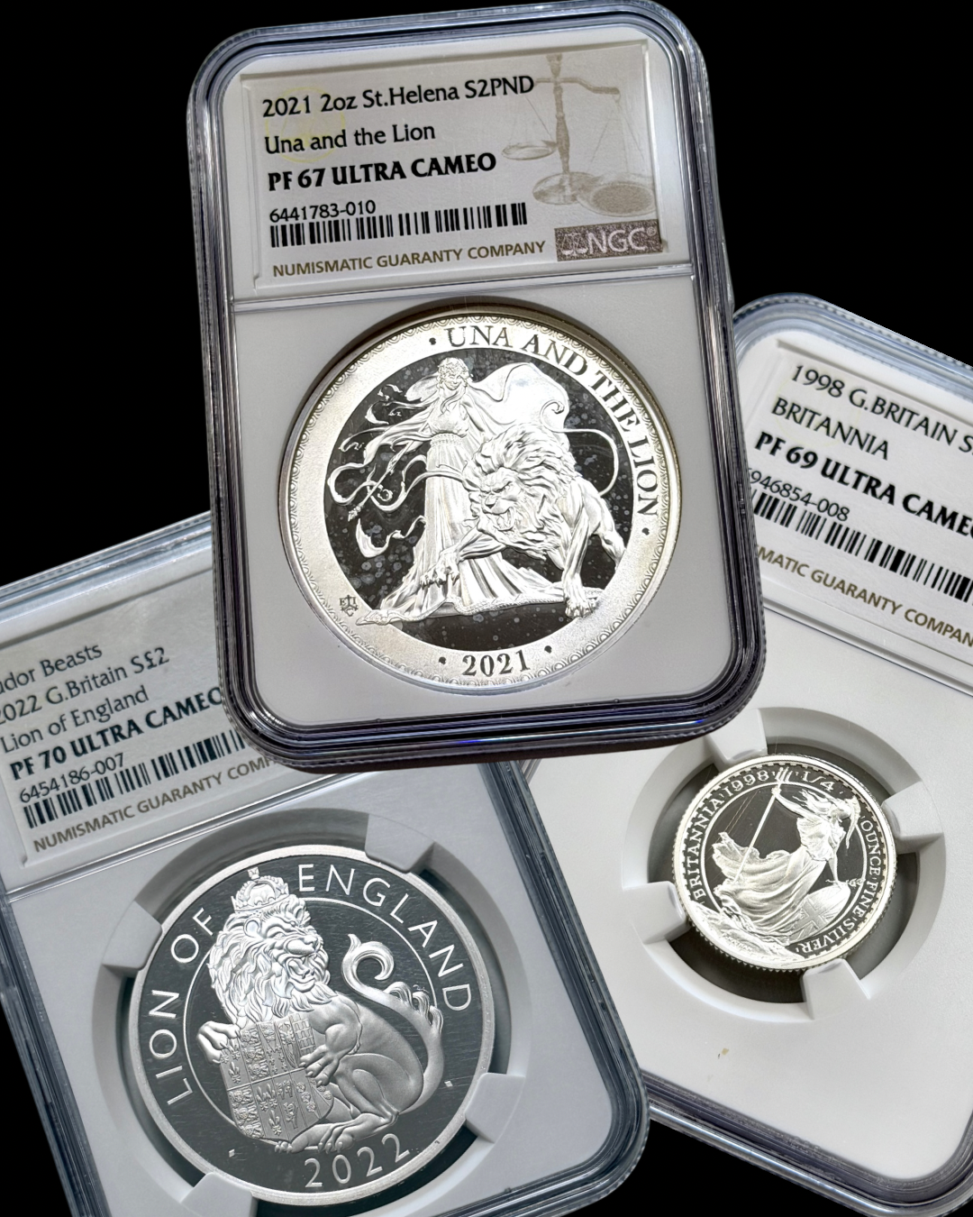 NGC-certified Ultra Cameo coins: 2021 Una and the Lion, 2022 Lion of England, and 1998 Britannia 50 Pence.